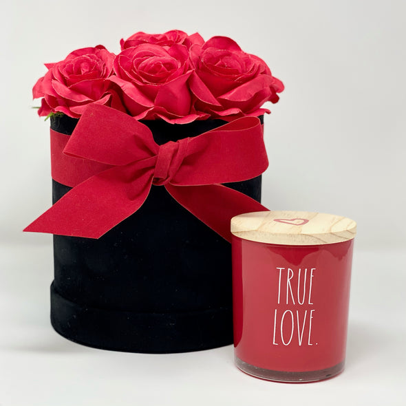 RED ROSES IN BLACK VELVET CIRCLE BOX WITH RED CANDLE