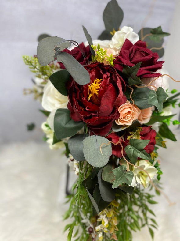 Maroon, pink and, white cascading wedding bouquet