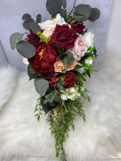 Maroon, pink and, white cascading wedding bouquet